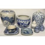 A COLLECTION OF VINTAGE ORIENTAL BLUE AND WHITE PORCELAIN ITEMS Including two ginger jars and covers