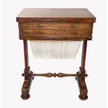 AN EARLY 19TH CENTURY ROSEWOOD LADIES' WORK TABLE The fold over top enclosing a green tooled leather
