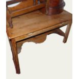 A VICTORIAN PINE WASHSTAND Having a shaped back and single drawer above a shelf. (85cm x 56cm x