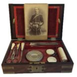 A VICTORIAN MAHOGANY BRASS AND IVORY MILITARY CAMPAIGN DRESSING SET The rectangular box having brass