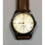 OMEGA, A VINTAGE STAINLESS STEEL GENT'S WATCH Having a silver tone dial set with gilt number