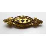 A VICTORIAN 15CT GOLD, SAPPHIRE AND DIAMOND BROOCH The single sapphire flanked by diamonds in a