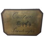 A GOOD 20TH CENTURY BRASS AND STEEL SHOP SIGN With incised illustration of a horse and carriage