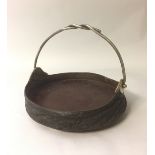 A TAXIDERMY 'ELEPHANTS FOOT' TRAY With white metal carrying handle and squat feet. (h 21cm)