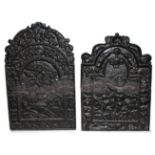 TWO ANTIQUE CAST IRON FIRE BACKS With floral decoration and boy. (61cm)