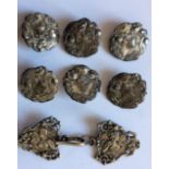 A SET OF SIX ART NOUVEAU SILVER BUTTONS Each featuring the head of a maiden with organic forms,