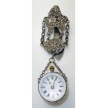 AN EARLY 20TH CENTURY CONTINENTAL SILVER GLOBE BALL WATCH AND CHATELAINE The white circular dial