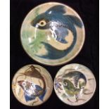 A COLLECTION OF THREE SPANISH MAJOLICA FISH PLATES Each decorated with a stylized fish, signed to