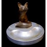 BOB COAN, AN EARLY 20TH CENTURY AMERICAN COLD PAINTED FIGURAL ASHTRAY Cast as a seated fox on a