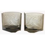 A PAIR OF ART DECO PERIOD CHROME AND FROSTED GLASS WALL LAMPS Each with a moulded design of two