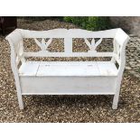 A PAINTED PINE DUTCH BENCH With scroll ends, pierced back and rise and fall seat. (126cm x 41cm x