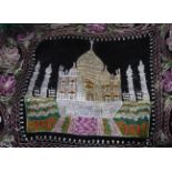 A 20TH CENTURY LINEN CLOTH Embroidered with an image of the Taj Mahal, sold together with an