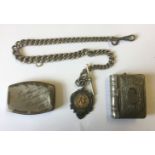 AN EARLY 20TH CENTURY SILVER ALBERT CHAIN Complete with a Football related fob for the Garrison