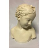 AFTER JEAN-BAPTISTE PIGALLE, 1714 - 1785, A PLASTER BUST Modelled as a young girl, incised to