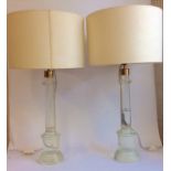 A PAIR OF VINTAGE MURANO GLASS LAMPS The clear glass with cylindrical columns on stepped circular