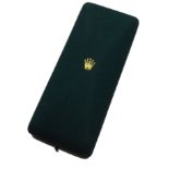A VINTAGE ROLEX WATCH BOX The emerald green exterior with Rolex gold crown logo and press release