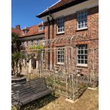 A MID 20TH CENTURY IRON PERGOLA The pagoda top, raised on six columns divided by panels decorated