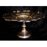 ATKIN BROTHERS, AN EARLY 20TH CENTURY SILVER TAZZA The top in the form of a stylised flower,
