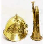 AN EARLY 20TH CENTURY FRENCH BRASS FIREMAN'S HELMET Having a pierced plaque stating 'Sapeurs,