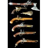 A COLLECTION OF SIX 20TH CENTURY REPLICA WALL HANGING PISTOLS Including an axe gun, four flintlock