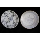 TEK SING, A PAIR OF EARLY 19TH CENTURY CHINESE PORCELAIN BLUE AND WHITE DISHES Hand painted with