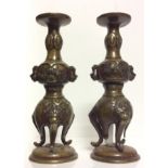 A PAIR CHINESE BRONZE BALUSTER CANDLESTICKS Cast with Hoho birds in flora and raised on mythical