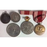 A WORLD WAR II AMERICAN MILITARY BRONZE GOOD CONDUCT MEDAL Cast with the American eagle and