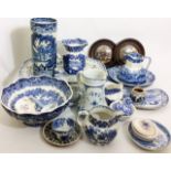 A COLLECTION OF 20TH CENTURY BLUE AND WHITE POTTERY ITEMS Including a meat plate warmer, a sleeve
