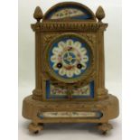 A 19TH CENTURY FRENCH SPELTER AND PORCELAIN MANTEL CLOCK Having acorn finials, a blue porcelain dial