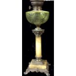 A VICTORIAN ALABASTER AND COLOURED GLASS OIL LAMP Having a green glass well with etched decoration