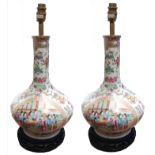 A PAIR OF 19TH CENTURY CHINESE CANTON VASES CONVERTED TO TABLE LAMPS On hardwood stands. (48cm)