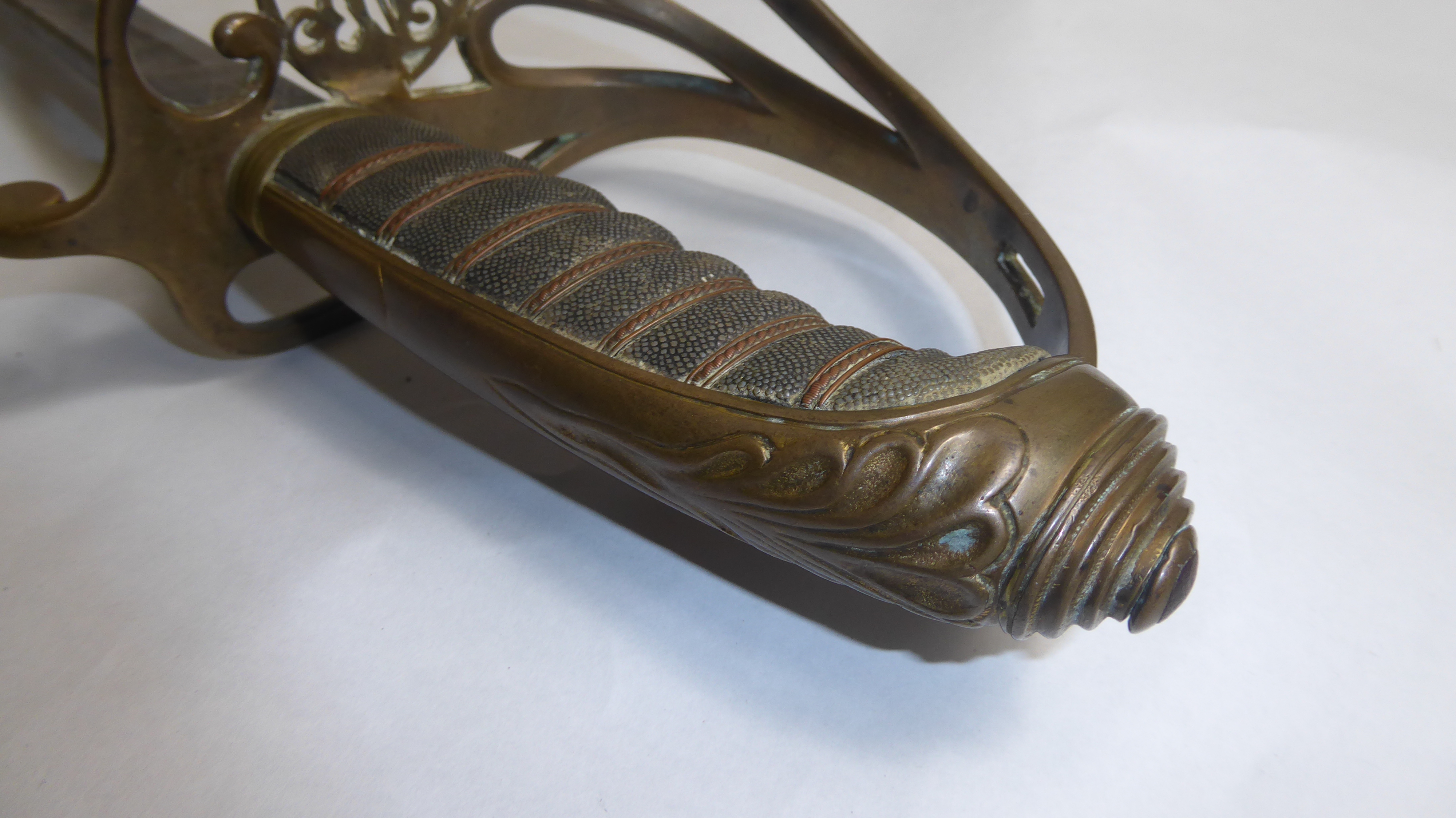 A VICTORIAN OFFICER'S SWORD Having foliate and scroll decoration to the blade, shagreen grip and a - Image 6 of 7