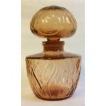 A LARGE 20TH CENTURY COLOURED GLASS SHOP DISPLAY PERFUME BOTTLE Having a dome lid, cut with stylized