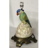 A MID 20TH CENTURY CONTINENTAL TABLE LAMP In the form of a parrot on bronze base (possibly