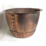 A LARGE SPHERICAL COPPER PLANTER With riveted construction, together with a similar planter with