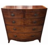 AN EARLY VICTORIAN MAHOGANY AND SATINWOOD BOW FRONTED CHEST Of two short above three long drawers,