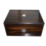 A VICTORIAN COROMANDEL SEWING BOX Having a mother of pearl cartouche and escutcheon, together with