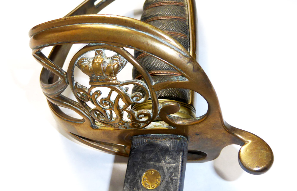 A VICTORIAN OFFICER'S SWORD Having foliate and scroll decoration to the blade, shagreen grip and a - Image 7 of 7