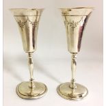 CHARLES S. GREEN & CO. LTD, A PAIR OF MID 20TH CENTURY SILVER GOBLETS With silver gilt interior