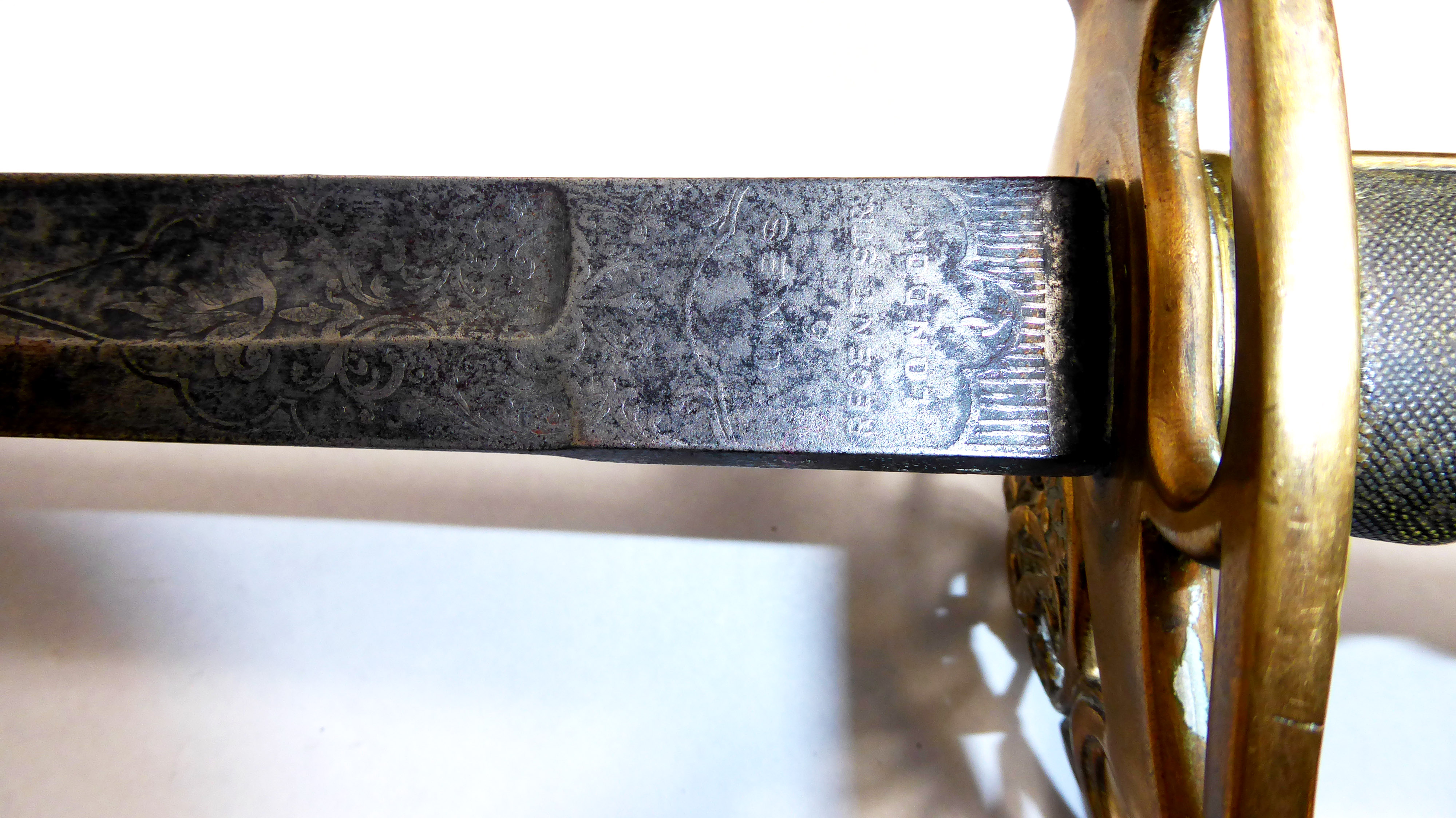 A VICTORIAN OFFICER'S SWORD Having foliate and scroll decoration to the blade, shagreen grip and a - Image 2 of 7