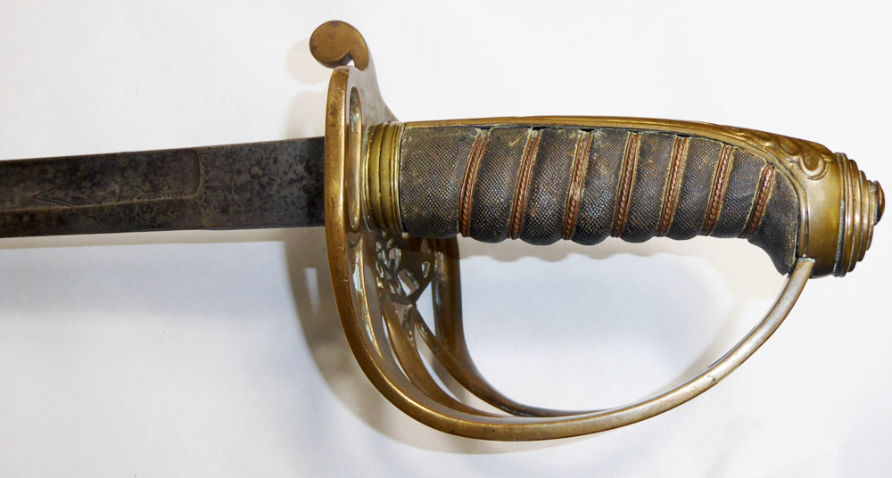 A VICTORIAN OFFICER'S SWORD Having foliate and scroll decoration to the blade, shagreen grip and a - Image 3 of 7