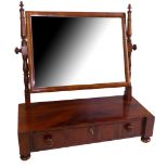 A GEORGIAN MAHOGANY TOILET MIRROR With three trinket drawers.