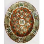 A 19TH CENTURY CHINESE CANTON FAMILLE ROSE OVAL PLATE. (37cm x 31cm)