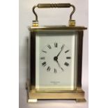 SHORTLAND BOWEN, A 20TH CENTURY GILT BRASS CARRIAGE CLOCK Having a brass carry handle and four