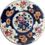 AN 18TH CENTURY CHINESE EXPORT PORCELAIN PLATE Hand painted with a floral display in Imari