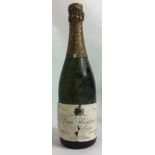 LOUIS ROEDERER, A BOTTLE OF VINTAGE 1975 CHAMPAGNE Bearing a gold cap and label 'Reims Imported by