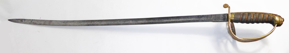 A VICTORIAN OFFICER'S SWORD Having foliate and scroll decoration to the blade, shagreen grip and a