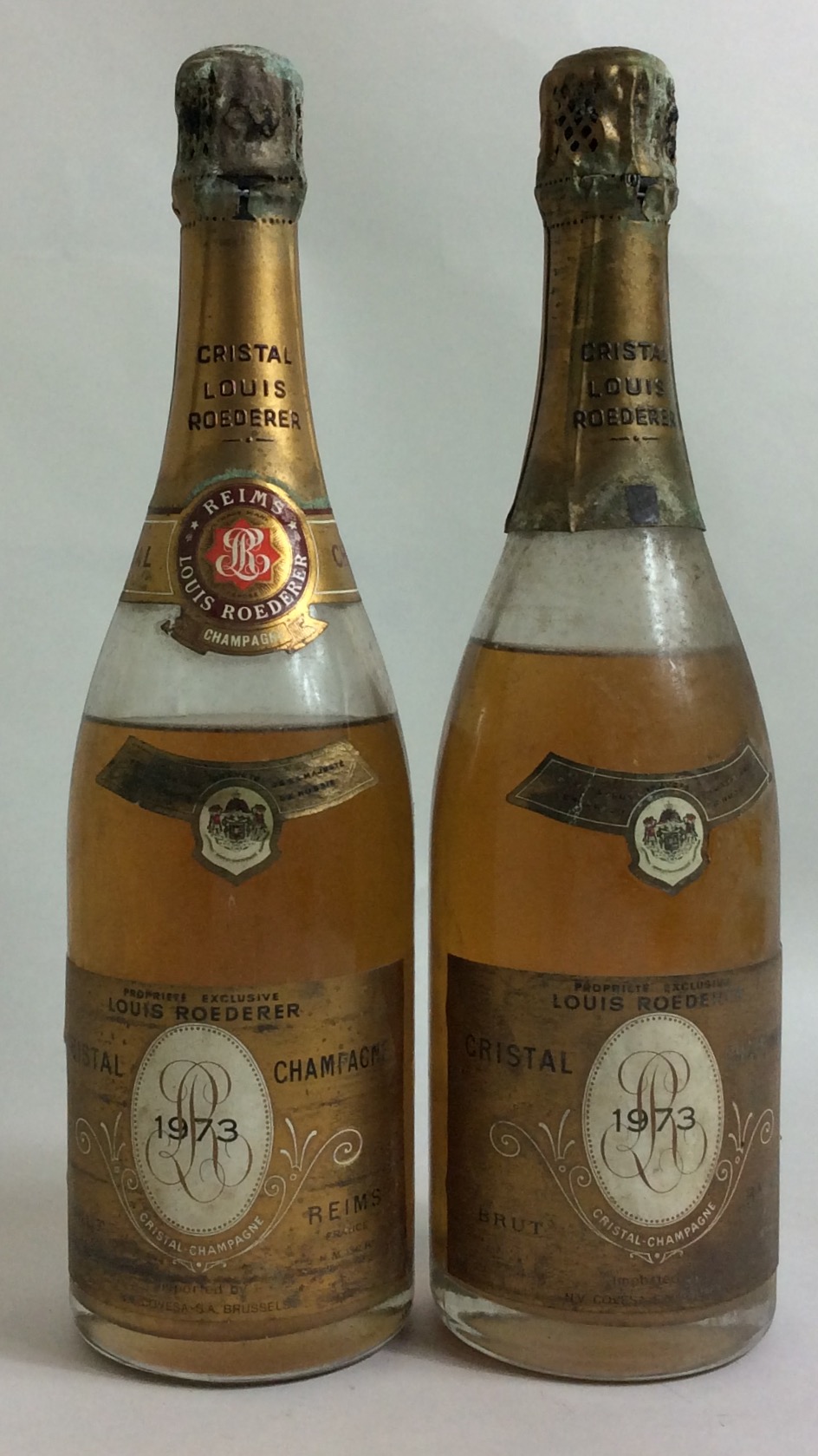 LOUIS ROEDERER, TWO BOTTLE OF VINTAGE 1973 CHAMPAGNE Having gold caps and labels 'Reims Imported