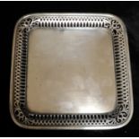 HOWARD & CO., NEW YORK, A 20TH CENTURY SILVER TRAY Having a pierced edge and incised monogram to the