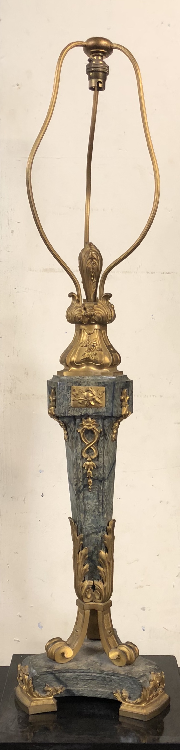 A LARGE A19TH CENTURY GREEN MARBLE AND GILT BRONZE TABLE LAMP Applied with plaques and foliage on
